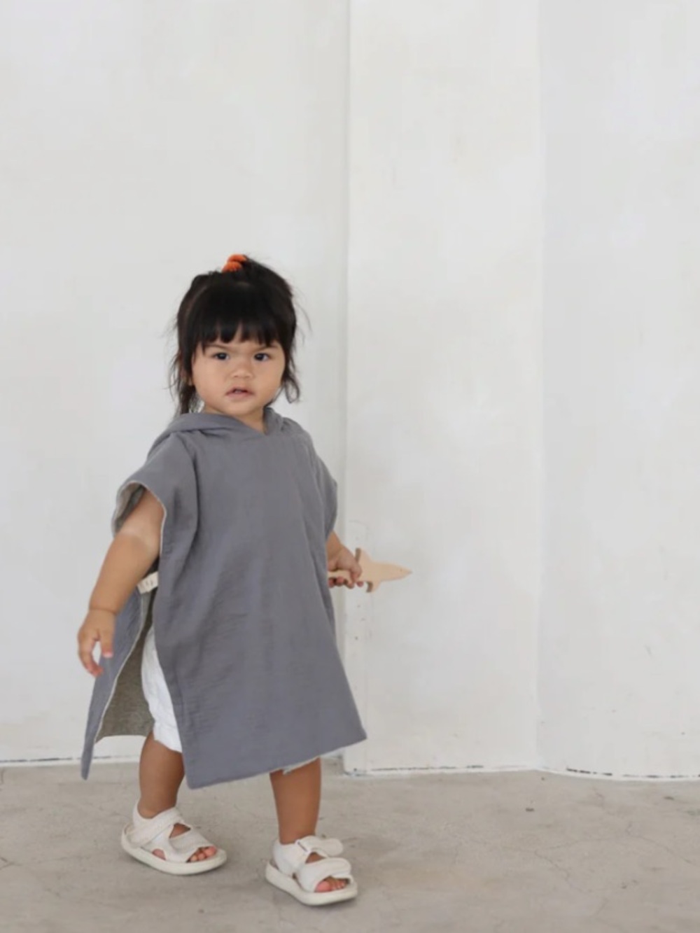 Big Little Universe blue poncho